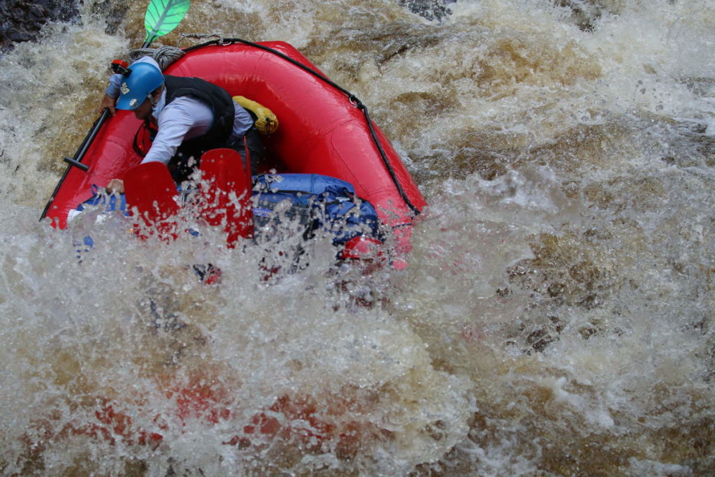 Mark buries his crew in whitewater - at Water by Nature Tasmania, Franklin River Rafting™