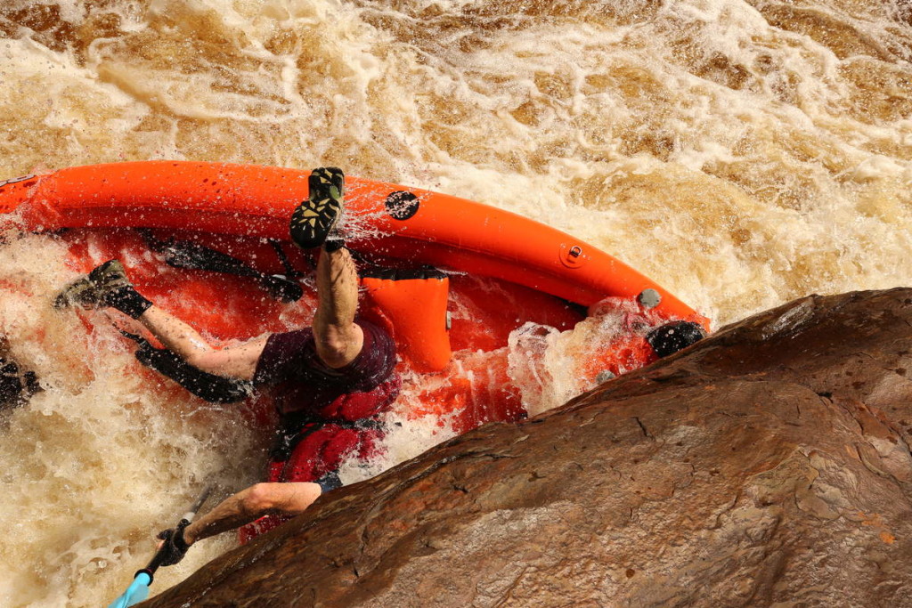 Feet up! Unconventional way to avoid foot entrapment - at Water by Nature Tasmania, Franklin River Rafting™