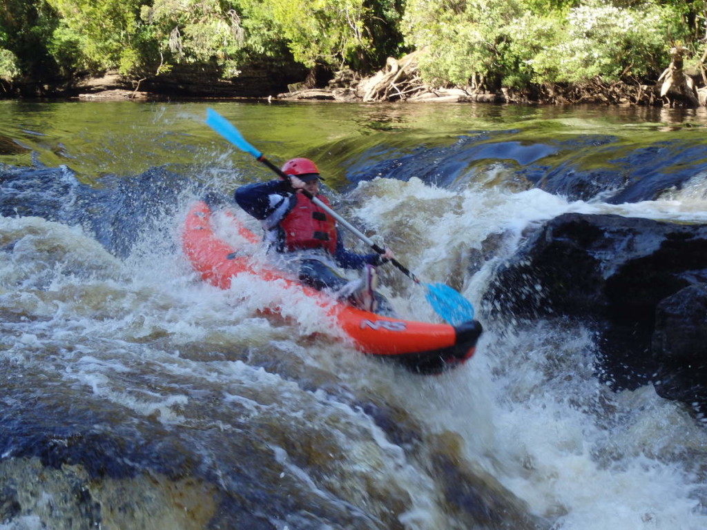 Sarah in action on Middle Fall - at Water by Nature Tasmania, Franklin River Rafting™