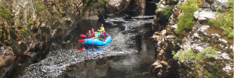 Raft drifting through the Irenabyss on the Franklin River