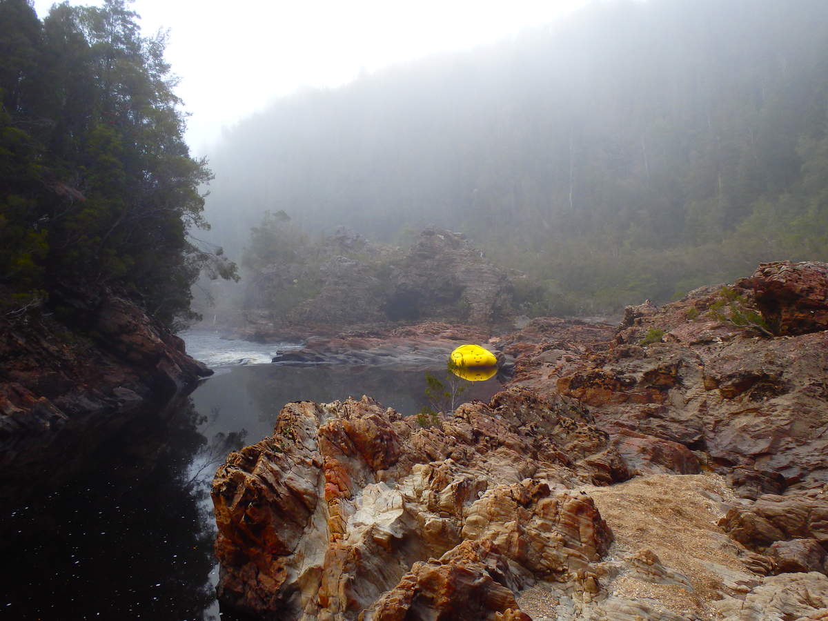 Morning mists at camp. — at Water by Nature Tasmania - Franklin River Rafting.