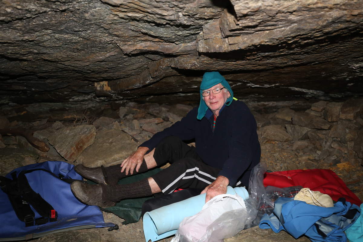 A legend - Les Tattersall, 80 yrs. right at home in the caves at Newlands camp - at Water by Nature Tasmania, Franklin River Rafting