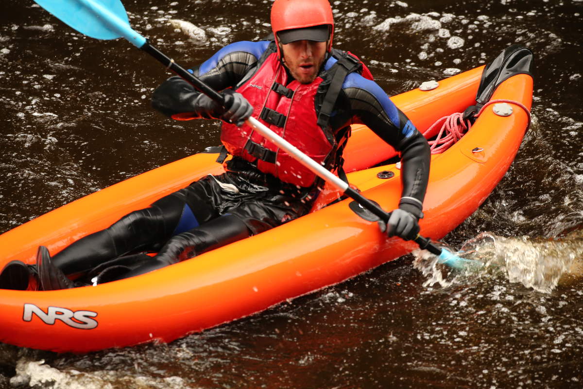 Aaron is having some fun in the inflatable kayak - at Water by Nature Tasmania, Franklin River Rafting ™