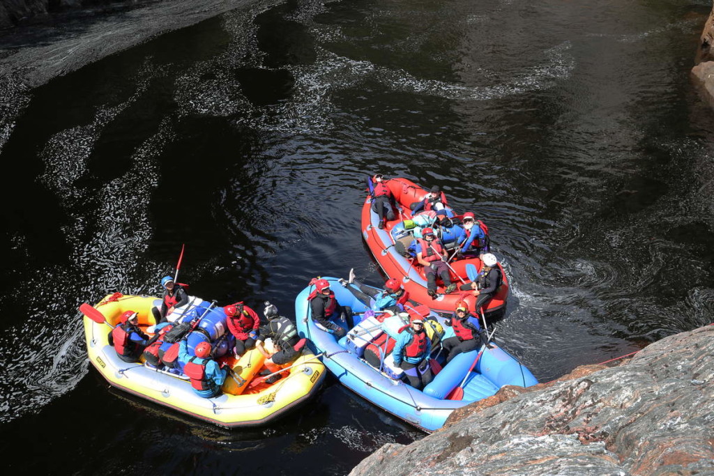 Resting in the sun after the Great Ravine - at Water by Nature Tasmania, Franklin River Rafting™